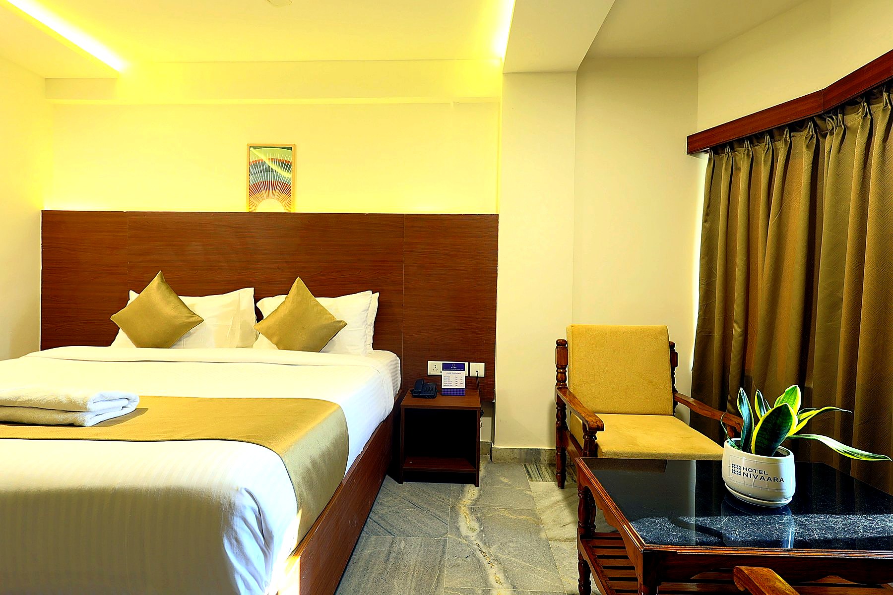 King-bed room with leather sofa and coffee table