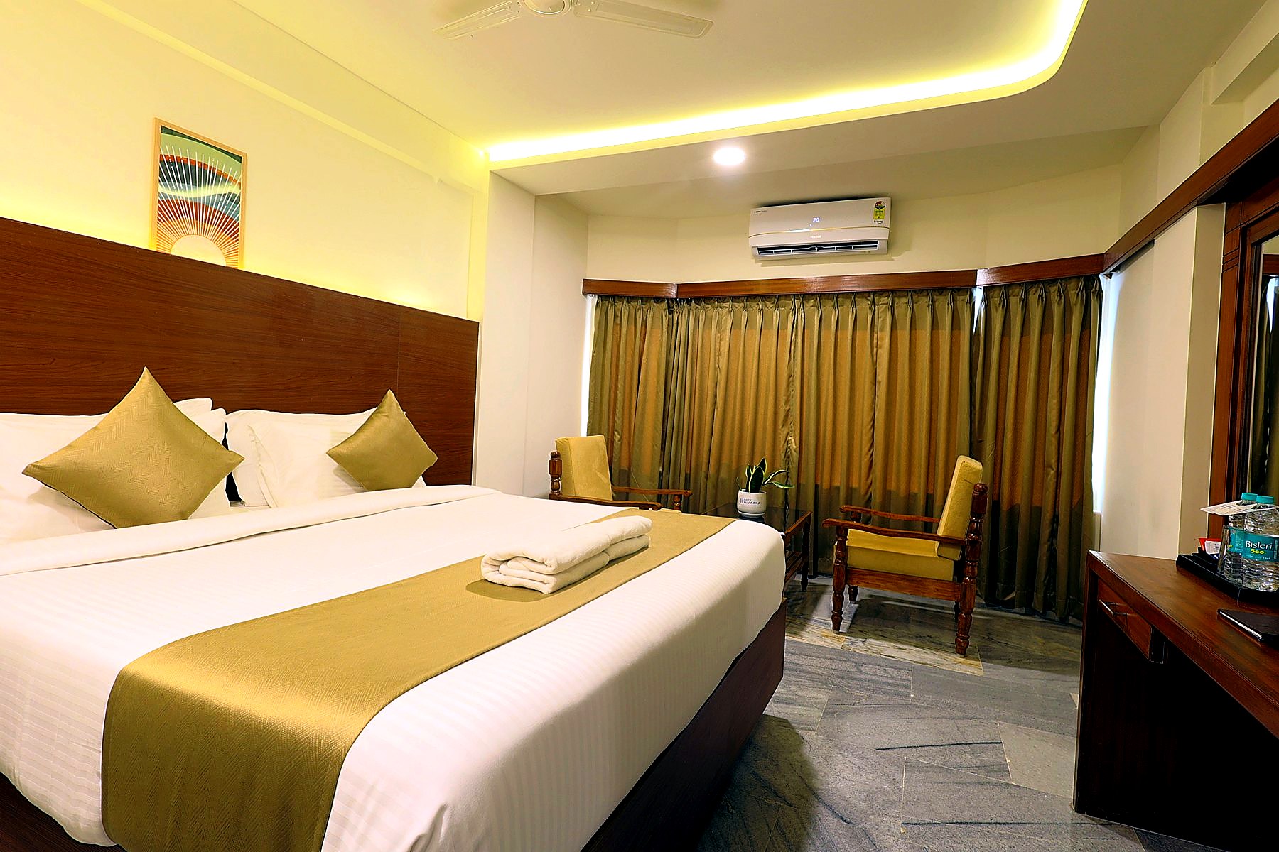 Warm-lit Executive Double room with king bed