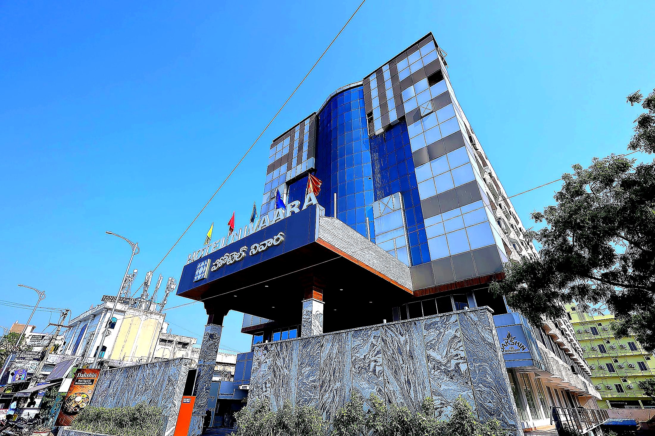 Angled street-level view of the Hotel Nivaara tower