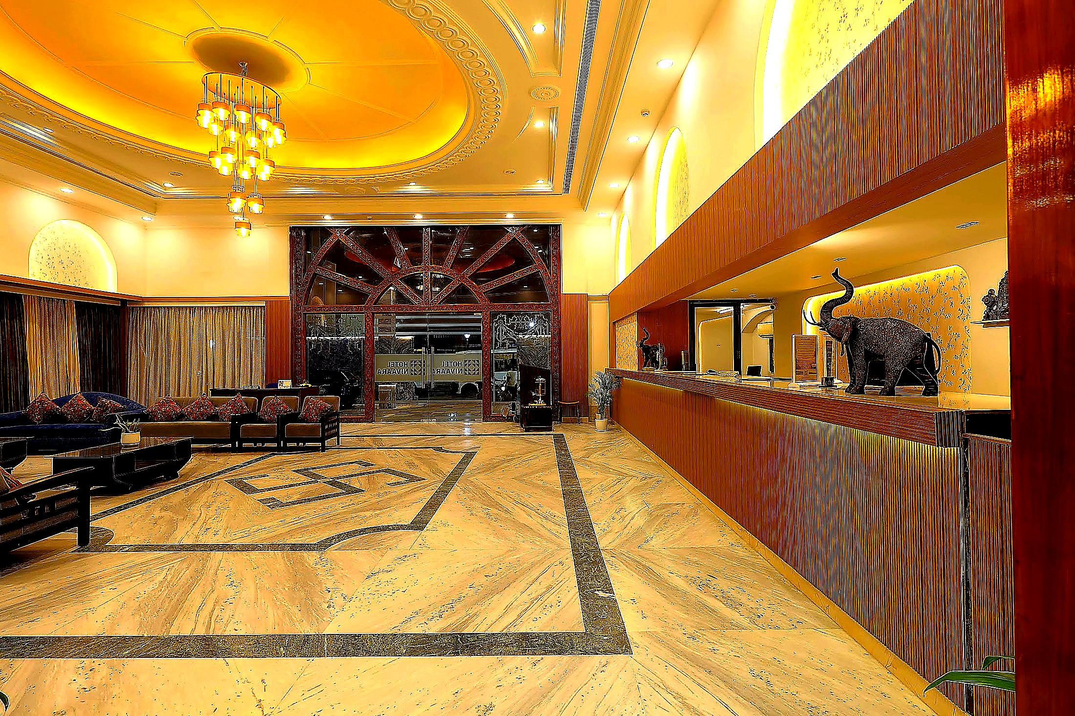 Reception counter framed in warm wood